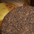 Xin Yi Hao Brand Bulang Gold Needle Pu-erh Tea Cake 2015 357g Ripe