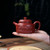 Handmade Yixing Zisha Clay Teapot Niu Zhuan Qian Kun 250ml