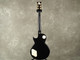 Vintage Guitars V100 - Black/Gold Hardware - 2nd Hand