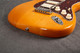 Fender American Deluxe Stratocaster HSS - Amber - Gig Bag - 2nd Hand Fender American Deluxe Stratocaster HSS - Amber - Gig Bag - 2nd Hand