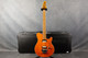 Ernie Ball Music Man Axis - Amber - Hard Case - 2nd Hand Ernie Ball Music Man Axis - Amber - Hard Case - 2nd Hand