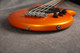 Ernie Ball Music Man Bongo 4 HH - Tangerine Pearl - 2nd Hand Ernie Ball Music Man Bongo 4 HH - Tangerine Pearl - 2nd Hand
