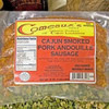 Comeaux'S Pork Andouille sausage, packaged smoked Cajun pork sausage in clear plastic wrapping with colorful label.