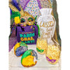 Creole Foods of Louisiana Mini King Cake Date Night, colorful Mardi Gras themed party setup with decorated king cakes, masks, and festive accessories.