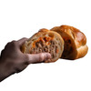 M&R Creole's Mini Stuffed Bread 12ct, hand holding a halved stuffed bread with savory meat filling inside.