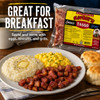 Savoies Pork Tasso 8oz, packaged smoked pork for breakfast, served with eggs, biscuits, and grits on a white plate.