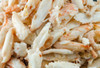 JV Foods Lump Crabmeat 1lb, close-up of shredded white crab meat for seafood dishes and recipes.