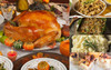 Creole Foods of Louisiana Large Traditional Turducken Feast, a roasted stuffed turkey surrounded by autumn decorations and served with mashed potatoes, stuffing, and side dishes.