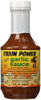 Cajun Power Garlic Sauce 16oz, bottle of savory garlic sauce with a yellow label and black and green text, featuring an illustration of a dog and used for seasoning or marinating various meats and seafoods.