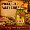 Cajun Chef Mild Pickled Okra 32oz jar, a glass jar filled with green pickled okra, shown on a table with Louisiana-themed snacks and surrounded by a sunset and swamp scenery, emphasizing the product's flavor and visual appeal.