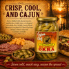 Cajun Chef Hot Pickled Okra 32oz, jar of spicy pickled okra in front of a backdrop of Cajun dishes and a sunset over water.