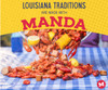 Manda Fine Meats Manda Mild Smoked Sausage 3lb Loops, a heap of cooked smoked sausage loops with lemon, corn on the cob, and cookies on a blue checkered table.