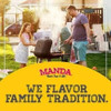 Manda Fine Meats Manda Jalapeno Boudin 12oz, spicy sausage link being grill-cooked outdoors with a man and girl enjoying a barbecue in the backyard.