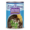 Blue Runner Refried Black Beans 16oz, canned refried black beans with garnishes of cilantro, crumbled cheese, and tortilla chips on a white plate.