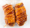 La Boucherie Bacon Wrapped Bayou Boudin Chicken 1 lb, raw chicken fillets wrapped with bacon and seasoned with spices in a plastic bag.