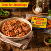 Manda Queso Smoked Sausage 12oz, product packaging with smoked sausages on a rustic wooden table, served in a bowl of jambalaya with vegetables.