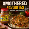 Savoies Light Roux 16oz, a jar of seasoned roux with a red lid, placed next to a Cajun dish with rice and sauce, in a rustic setting with vegetables in the background.