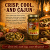Cajun Chef Hot Pickled Okra 12oz, jar of bright green pickled okra with Louisiana Cajun branding on the label, placed on a rustic wooden table with cheese, meats, and a sandwich in the background, emphasizing Louisiana flavor and spicy snack appeal.