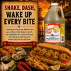 Cajun Chef Green Louisiana Hot Sauce 128oz, a large plastic jug of hot sauce with a red and white label featuring a chef mascot, set against a background of a sunset over a river with a wooden dock and surrounded by Louisiana-style dishes including fried chicken, oysters, and a po' boy sandwich with toppings and condiments.