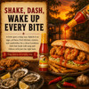 Cajun Chef Louisiana Hot Sauce 6oz, bottle of hot sauce pouring over a spicy fried chicken po' boy sandwich with vegetables, on a rustic wooden table at sunset.