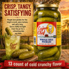 Cajun Chef Whole Dill Pickles 128oz, jar of crunchy, tangy, and satisfying dill pickles with a glass of pickle juice, fresh dill, and pickles on a wooden surface at sunset.