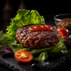 Poche's Poches Gator Patties 4 Pack, grilled hamburger patty with ketchup on top, served on lettuce with cherry tomatoes and surrounded by fresh vegetables.
