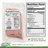 Gator World Alligator Filets 1lb, frozen alligator meat in clear vacuum-sealed packaging with a label featuring a cartoon alligator chef, nutritional info, and USDA certification.