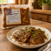 Poche's Pork Grillades 2lb, packaged seasoned pork for grilling, ready to cook, with a plate of cooked pork grillades served over rice garnished with green onions in the foreground.