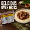 Comeaux's Pork Tasso, cooked pork seasoning served over creamy polenta with green onions.