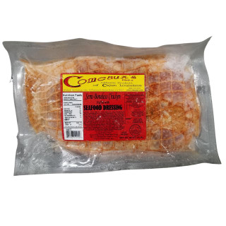 Comeaux's Stuffed Chicken w/ Seafood 4lb, packaged semi-boneless chicken stuffed with seafood dressing in clear vacuum-sealed plastic.