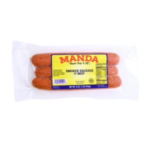 Manda Fine Meats Manda Smoked Beef Sausage 1lb, packaged smoked beef sausage in vacuum-sealed plastic, yellow label with red and black text, net weight 16 oz., ready to cook or eat.