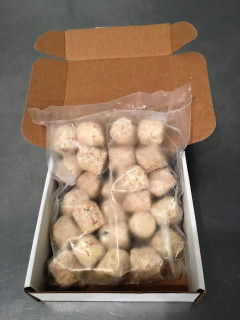 Cajun Original Shrimp Cajun Bites 1lb (26 Bites), frozen shrimp bites in a clear plastic bag inside a white box.