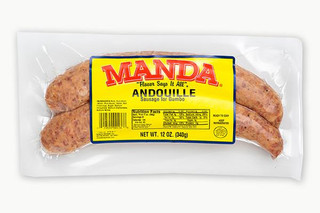 Manda Fine Meats Manda Andouille Links 12oz, packaged raw sausage links in vacuum-sealed plastic packaging with a yellow label.
