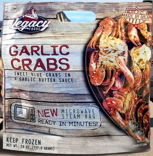Legacy Foods Legacy Garlic Crab 21oz, frozen sweet blue crabs in garlic butter sauce with microwave steam bag for quick preparation.