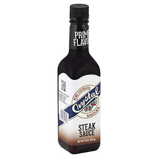 Crystal Steak Sauce 10oz, a dark glass bottle of steak sauce with a white and navy label featuring the Crystal logo and description of the product.