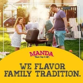 Manda Fine Meats Manda Pork Boudin Family Pack 2.25lb, image of a family enjoying a backyard barbecue with a grill and outdoor chairs.