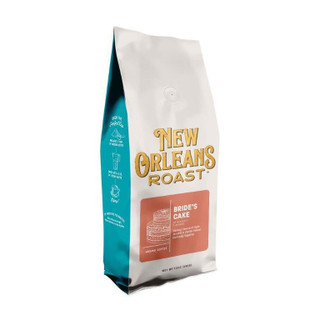 New Orleans Roast Bride's Cake 12oz Ground Coffee, premium roasted coffee in white and teal packaging with a cake illustration and flavor description.