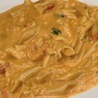 Carnival Creole Shrimp Pasta 4lb, creamy shrimp pasta dish with visible shrimp, herbs, and sauce.