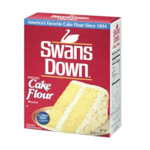 Swans Down 32 oz. cake flour, front view of the boxed product with cake imagery and branding.