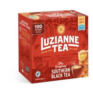Luzianne Single Tea Bags 100 Count, box of tea bags for brewing Southern black tea displayed on a red package with images of tea cups and lemon.
