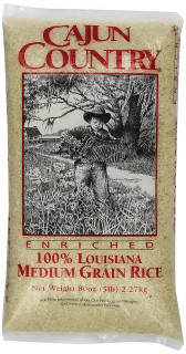 Cajun Country Medium Grain Rice 5lb, package featuring a black and white illustration of a boy with a hat carrying rice in a rural Louisiana scene.