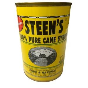 Steen's Pure Cane Syrup 12oz Can, yellow container with black and red text and a black and white image of a farm house.