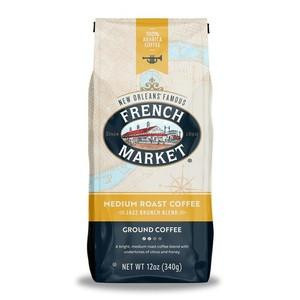 French Market Coffee Jazz Brunch Blend Medium Roast Yellow Bag 12 oz, ground coffee in a yellow and white package with a logo featuring a boat and the text 'French Market'.