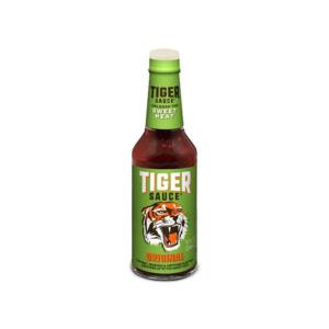 Try Me Tiger Sauce 10 oz, bottle of hot sauce with green label and tiger logo.