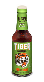 Try Me Tiger Sauce 10 oz, green plastic bottle with a tiger logo and bold label indicating original flavor, perfect for enhancing meat and seafood dishes.