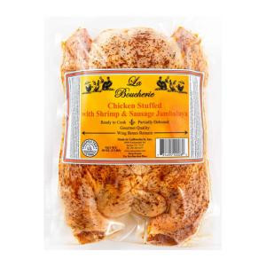 La Boucherie Shrimp & Sausage Jambalaya Stuffed Cajun Style Chicken, raw whole chicken with label showing product details and ingredients.