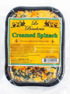 La Boucherie Creamed Spinach Side Dish 2 lb, packaged in a black plastic container with a yellow label featuring cooking instructions and brand information.