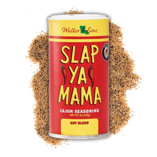 Slap Ya Mama Hot Blend Cajun Seasoning 4oz, spice container with red and yellow label surrounded by seasoning powder.