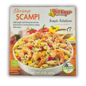 Big Easy Shrimp Scampi 8oz, package displaying a serving of shrimp scampi with lemon and herbs on a yellow plate.