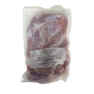 Alligator Legs Bone In 1lb, packaged alligator meat legs in vacuum-sealed bag.